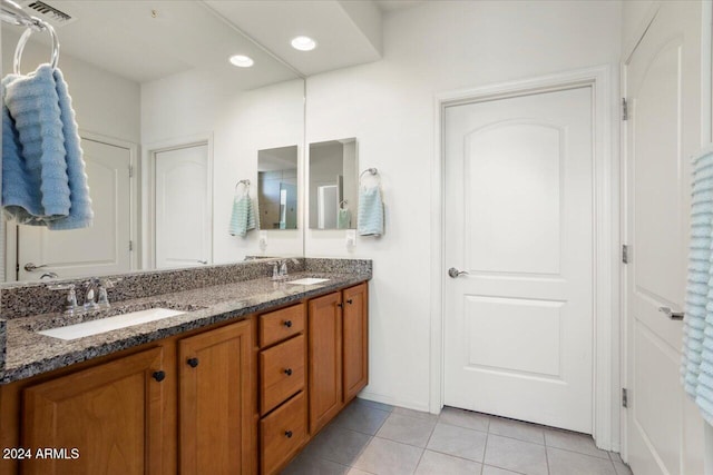 bathroom with vanity and tile patterned floors