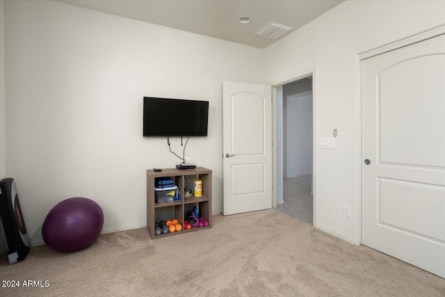 rec room with light carpet