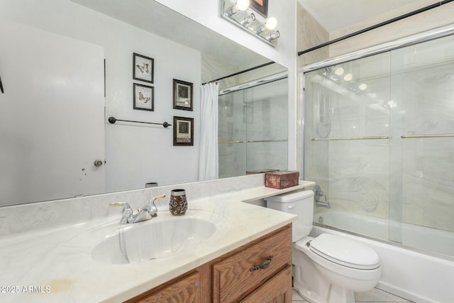 full bathroom featuring shower / bath combo, vanity, and toilet