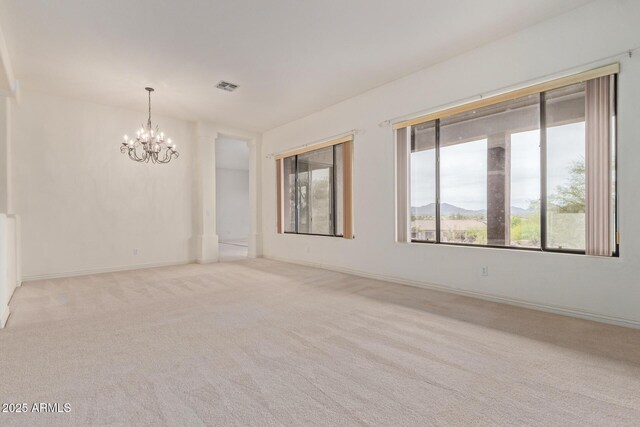 18 E Paint Your Wagon Trl, Phoenix, AZ 85085 - carpeted spare room featuring a chandelier and baseboards