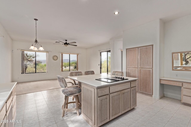 18 E Paint Your Wagon Trl, Phoenix, AZ 85085 - kitchen featuring black electric stovetop, a kitchen bar, light countertops, an office area, and recessed lighting