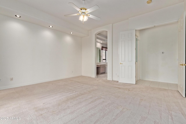 18 E Paint Your Wagon Trl, Phoenix, AZ 85085 - unfurnished room with arched walkways, light carpet, ceiling fan, recessed lighting, and baseboards