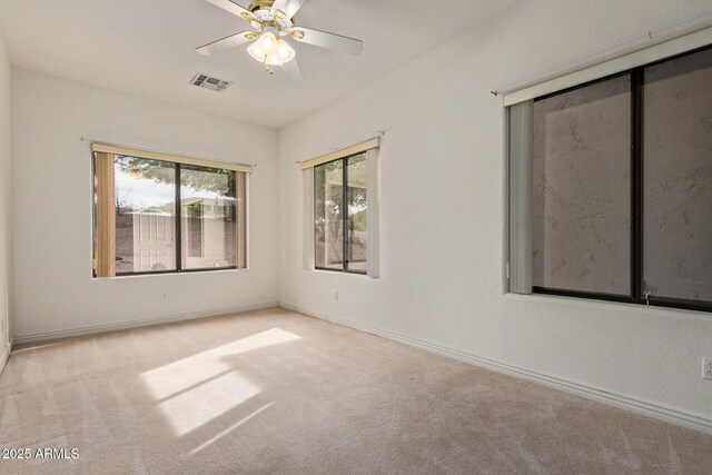 18 E Paint Your Wagon Trl, Phoenix, AZ 85085 - unfurnished room with carpet, baseboards, and a ceiling fan