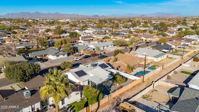 bird's eye view with a residential view and a mountain view