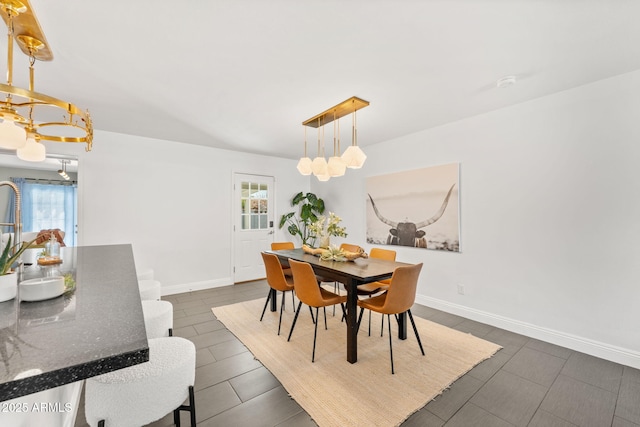 dining space with baseboards