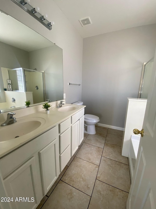 full bathroom featuring tile patterned floors, toilet, independent shower and bath, and vanity