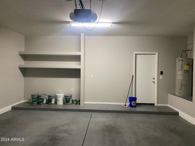 garage featuring a garage door opener and water heater