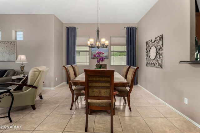 6202 E Mckellips Rd Unit 183, Mesa, AZ 85215 - dining area featuring a chandelier, light tile patterned flooring, and plenty of natural light