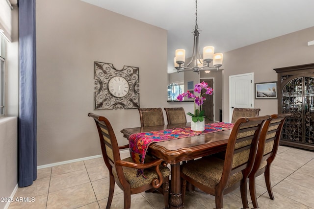 6202 E Mckellips Rd Unit 183, Mesa, AZ 85215 - dining room featuring a chandelier, light tile patterned flooring, and baseboards