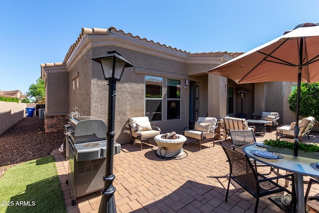 6202 E Mckellips Rd Unit 183, Mesa, AZ 85215 - view of patio featuring an outdoor living space with a fire pit