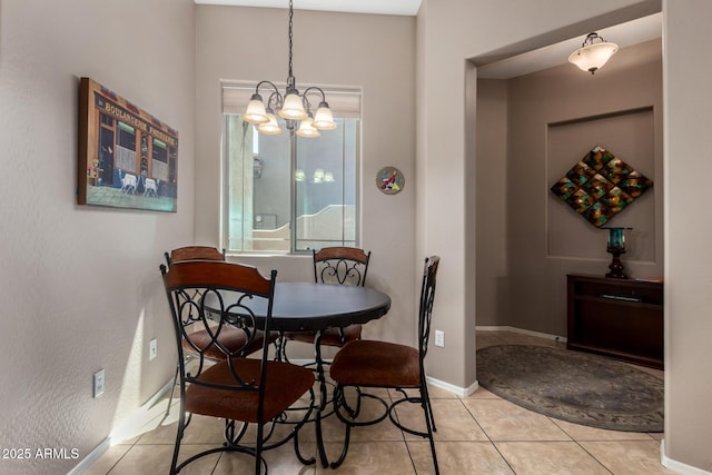 6202 E Mckellips Rd Unit 183, Mesa, AZ 85215 - dining space with a chandelier, baseboards, and light tile patterned floors
