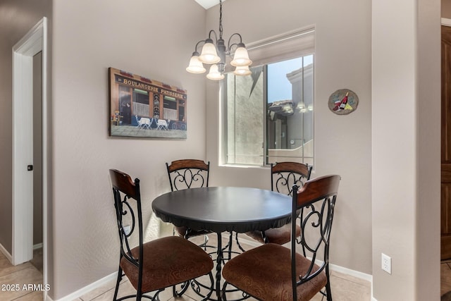 6202 E Mckellips Rd Unit 183, Mesa, AZ 85215 - dining space with a chandelier, baseboards, and light tile patterned floors