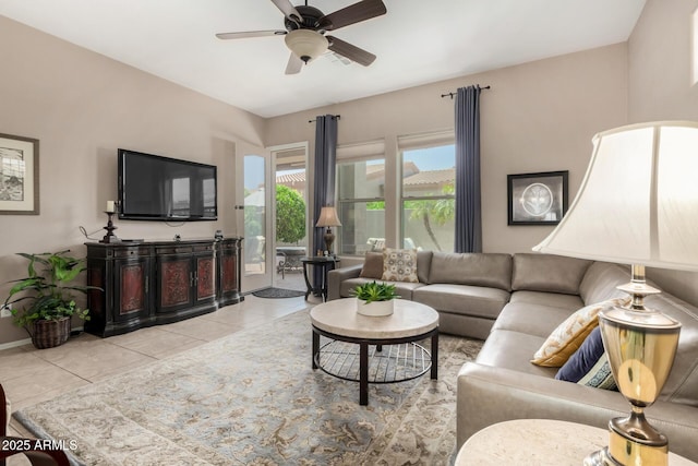 6202 E Mckellips Rd Unit 183, Mesa, AZ 85215 - living room with a ceiling fan, light tile patterned floors, and baseboards