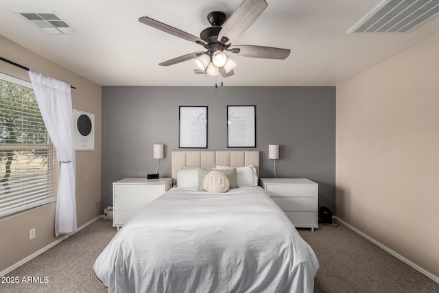 carpeted bedroom featuring ceiling fan