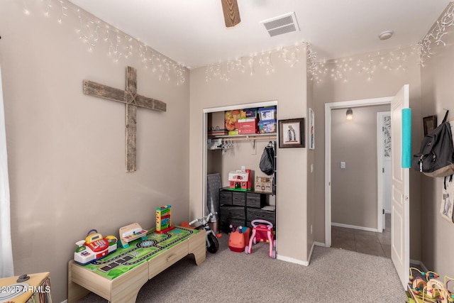 playroom featuring light carpet