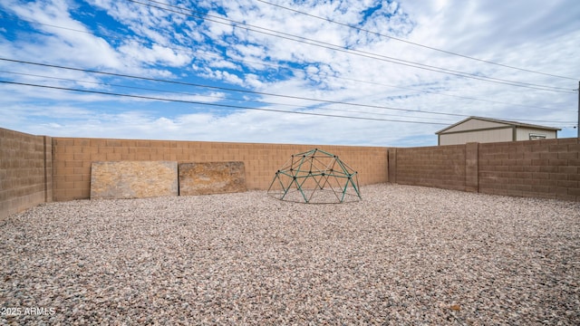 23941 N High Dunes Dr, Florence, AZ 85132 - view of yard with a fenced backyard and a playground