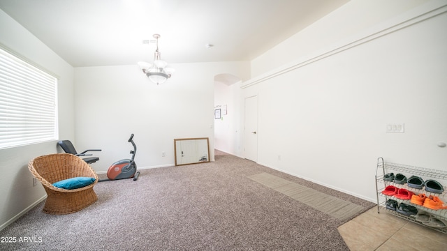 23941 N High Dunes Dr, Florence, AZ 85132 - sitting room with baseboards, a chandelier, carpet floors, arched walkways, and visible vents