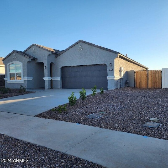 view of front of home with a garage