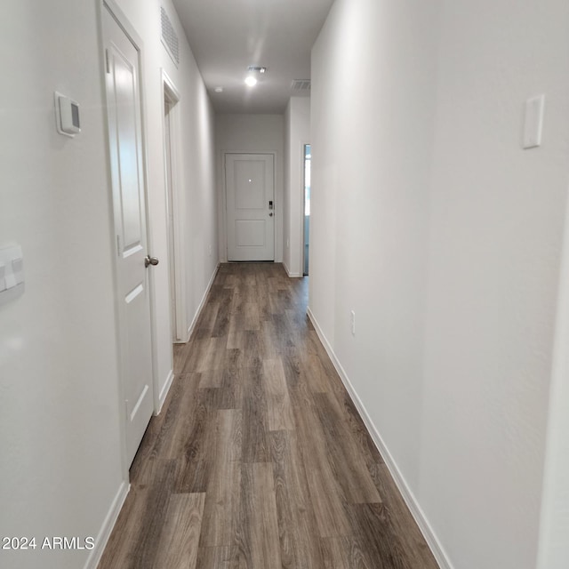 hallway featuring hardwood / wood-style flooring