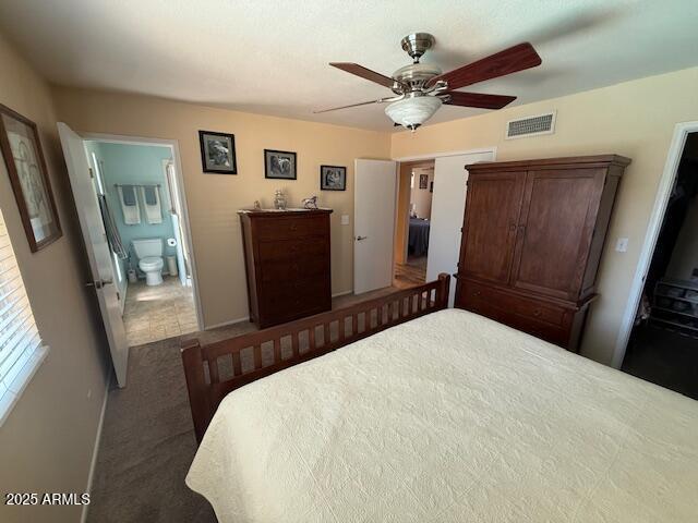 12601 N 34th St, Phoenix, AZ 85032 - bedroom featuring ensuite bathroom, ceiling fan, carpet, visible vents, and baseboards