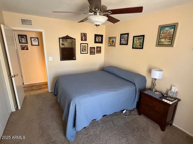 12601 N 34th St, Phoenix, AZ 85032 - carpeted bedroom with visible vents and ceiling fan