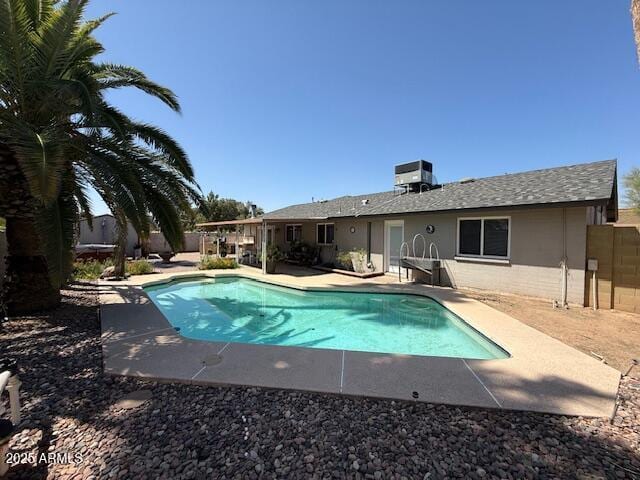 12601 N 34th St, Phoenix, AZ 85032 - view of swimming pool with a patio, fence, a fenced in pool, and central AC unit