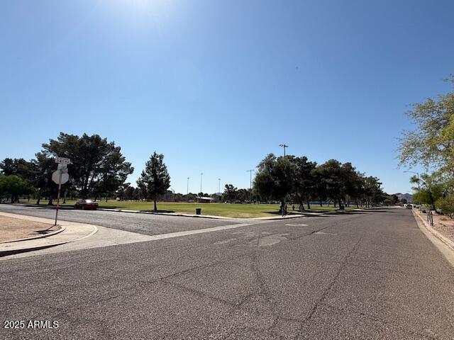12601 N 34th St, Phoenix, AZ 85032 - view of road with curbs and traffic signs