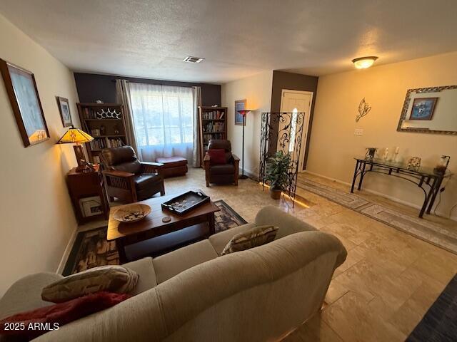 12601 N 34th St, Phoenix, AZ 85032 - living room with visible vents and baseboards