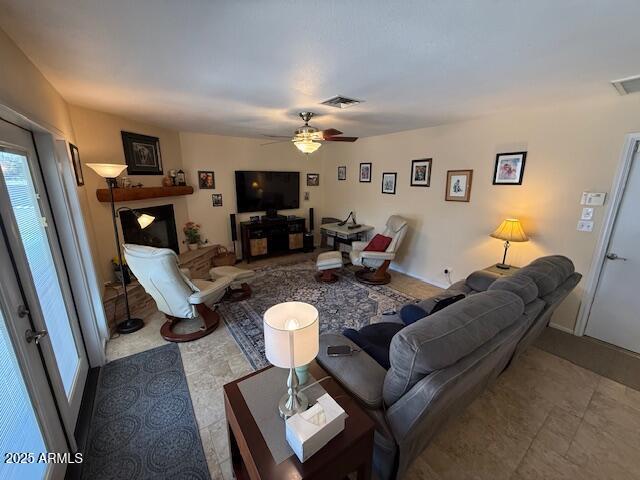 12601 N 34th St, Phoenix, AZ 85032 - living area featuring visible vents and a ceiling fan