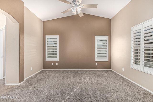 19576 N Portarosa Ct, Maricopa, AZ 85138 - carpeted spare room featuring ceiling fan, lofted ceiling, arched walkways, and baseboards