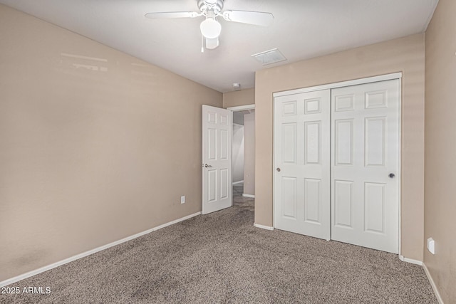 19576 N Portarosa Ct, Maricopa, AZ 85138 - unfurnished bedroom with carpet floors, baseboards, and a closet