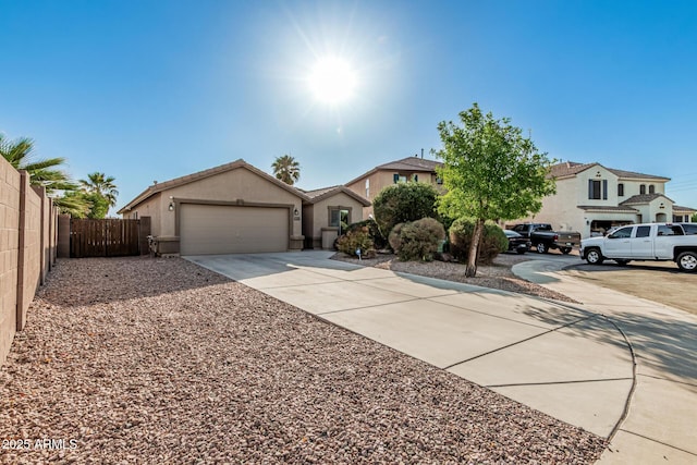 19576 N Portarosa Ct, Maricopa, AZ 85138 - view of front of property featuring driveway, a garage, and stucco siding