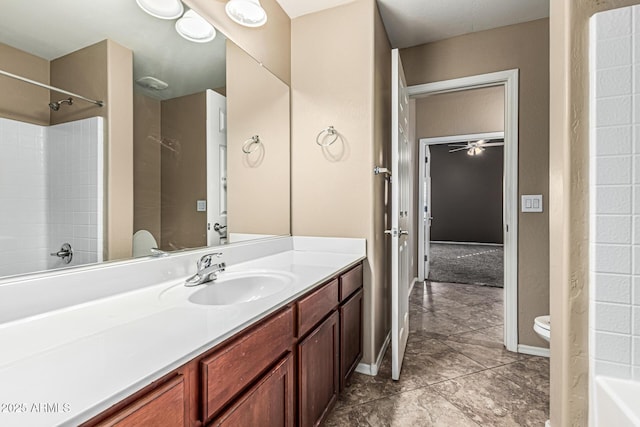 19576 N Portarosa Ct, Maricopa, AZ 85138 - bathroom with toilet, vanity, a shower, and a ceiling fan