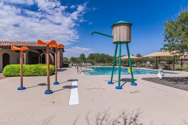 19576 N Portarosa Ct, Maricopa, AZ 85138 - view of jungle gym with a community pool and a patio area