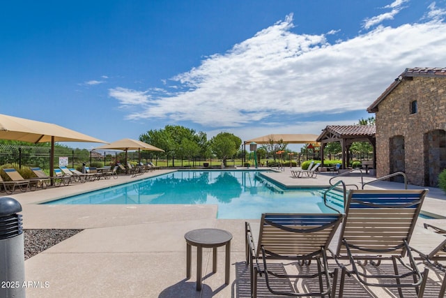 19576 N Portarosa Ct, Maricopa, AZ 85138 - community pool with a gazebo and a patio area