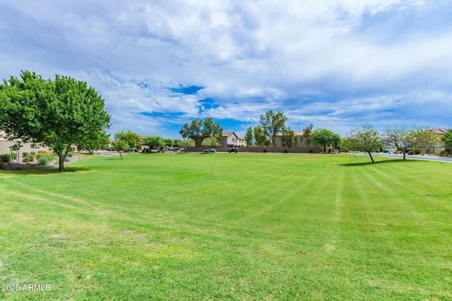 19576 N Portarosa Ct, Maricopa, AZ 85138 - view of community with a lawn