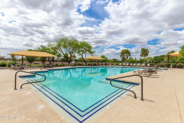 19576 N Portarosa Ct, Maricopa, AZ 85138 - community pool with a patio area