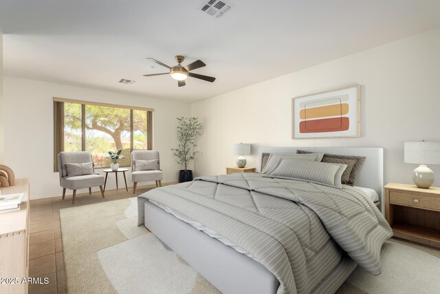 tiled bedroom featuring ceiling fan and visible vents