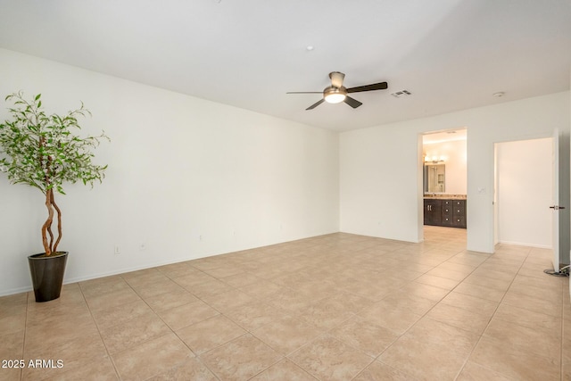 unfurnished room with visible vents, ceiling fan, and light tile patterned flooring