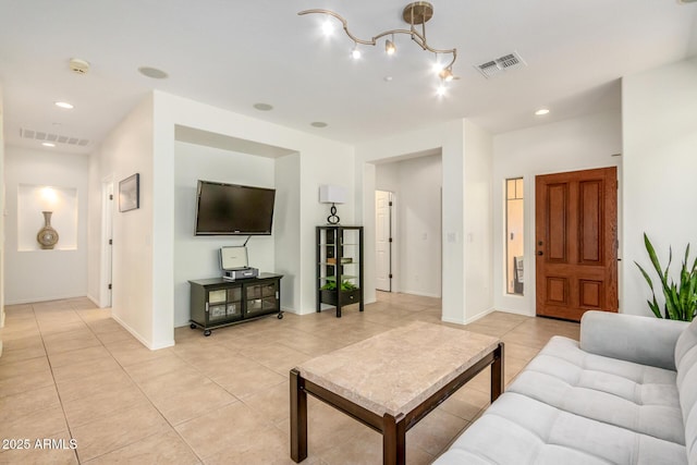 living room with recessed lighting, visible vents, baseboards, and light tile patterned floors