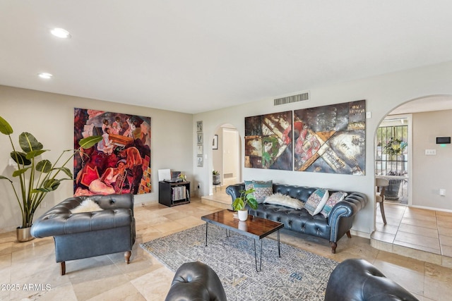 living room with light tile patterned floors