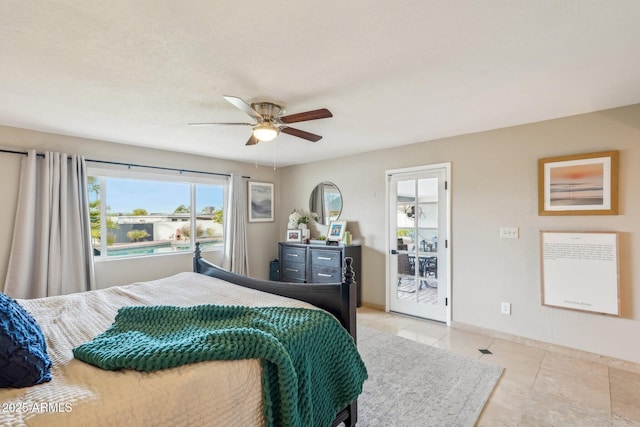 bedroom featuring ceiling fan and light tile patterned flooring