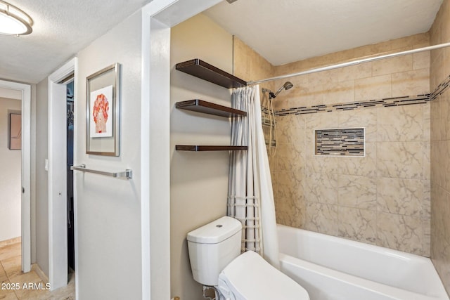 bathroom featuring tile patterned flooring, shower / bath combo, toilet, and a textured ceiling