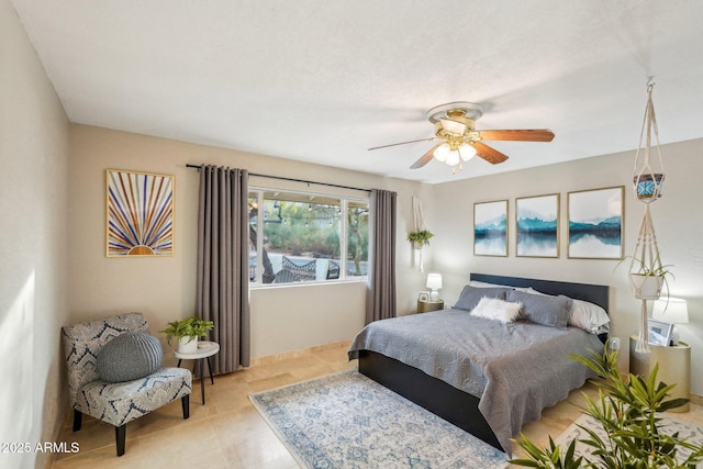 bedroom featuring ceiling fan