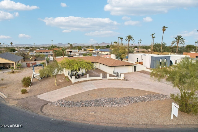 view of front of property with a mountain view