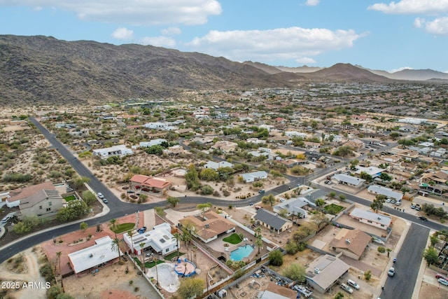 drone / aerial view featuring a mountain view