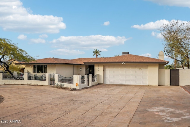 single story home with a garage