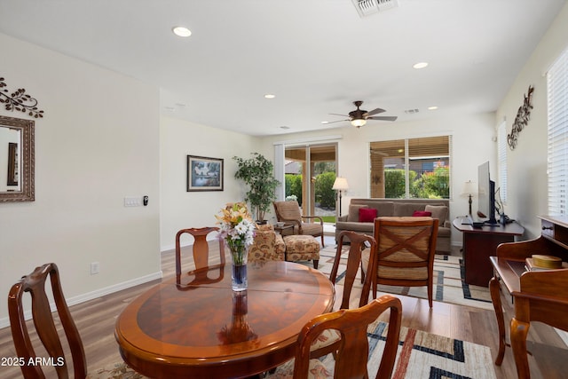 dining space with visible vents, baseboards, recessed lighting, wood finished floors, and a ceiling fan