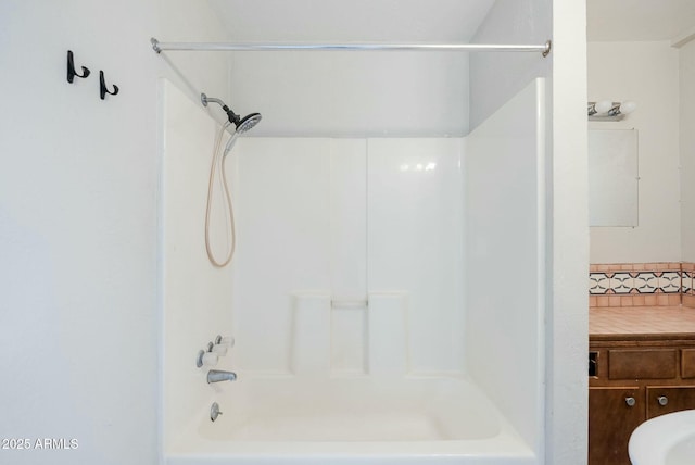 full bath featuring shower / bathing tub combination