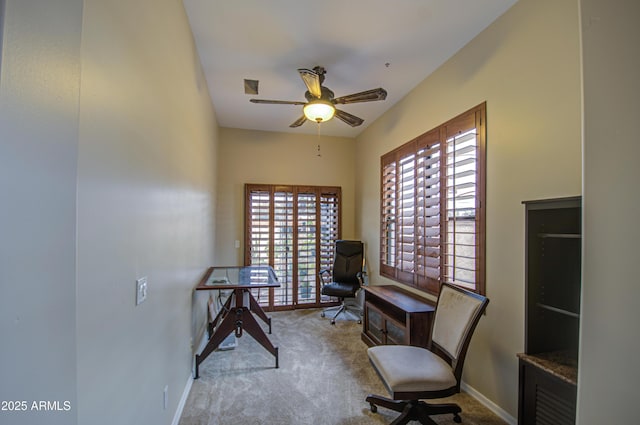 sitting room with carpet flooring, ceiling fan, and baseboards